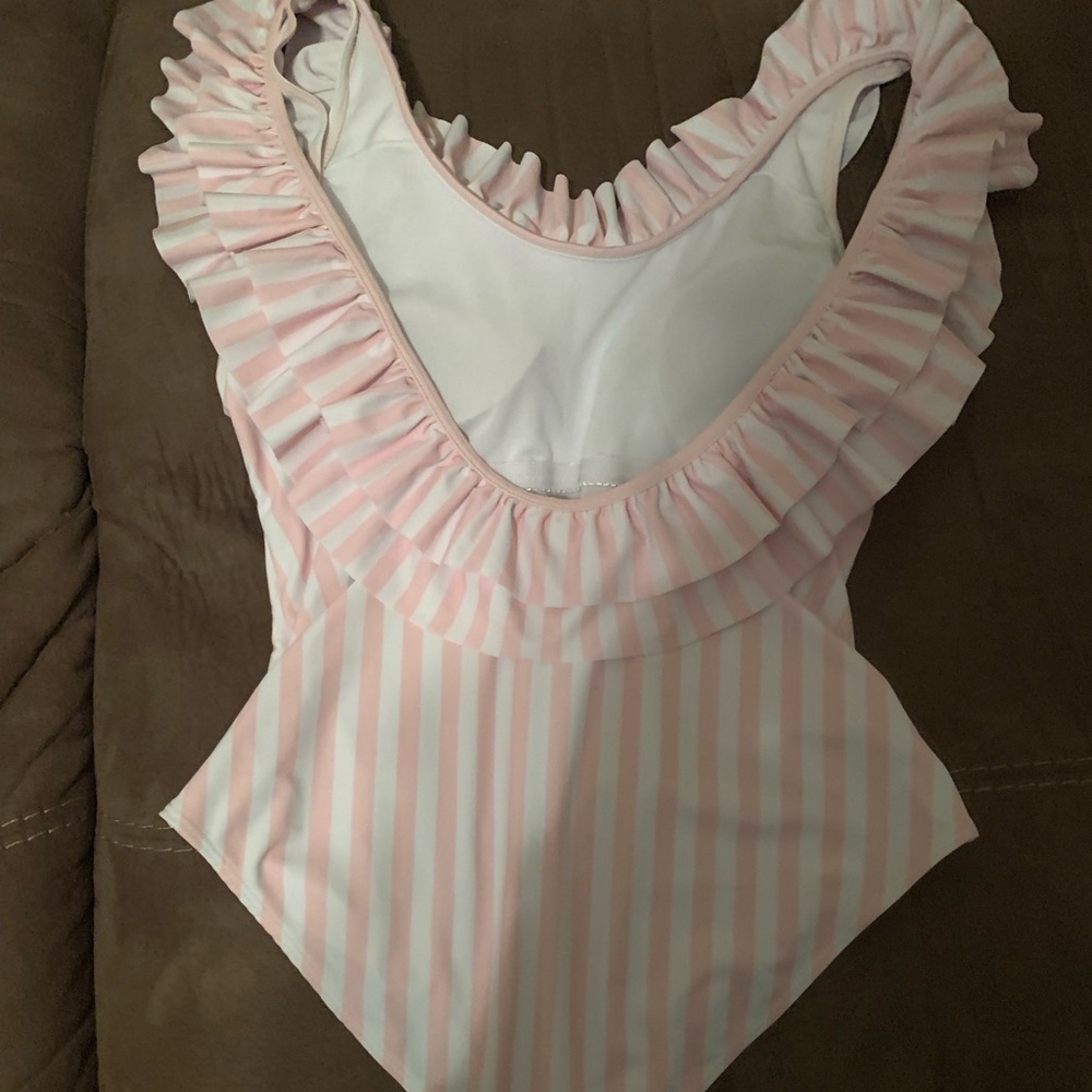 New without tags boutique one piece, never worn or even gotten wet.